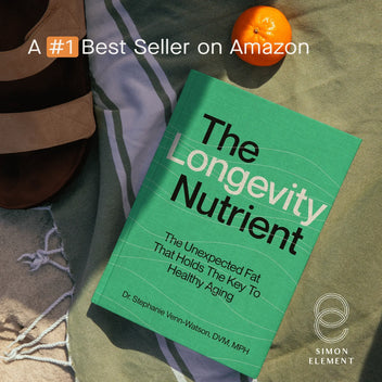 Book 'The Longevity Nutrient' labeled Best Seller on Amazon beside sandals and orange.