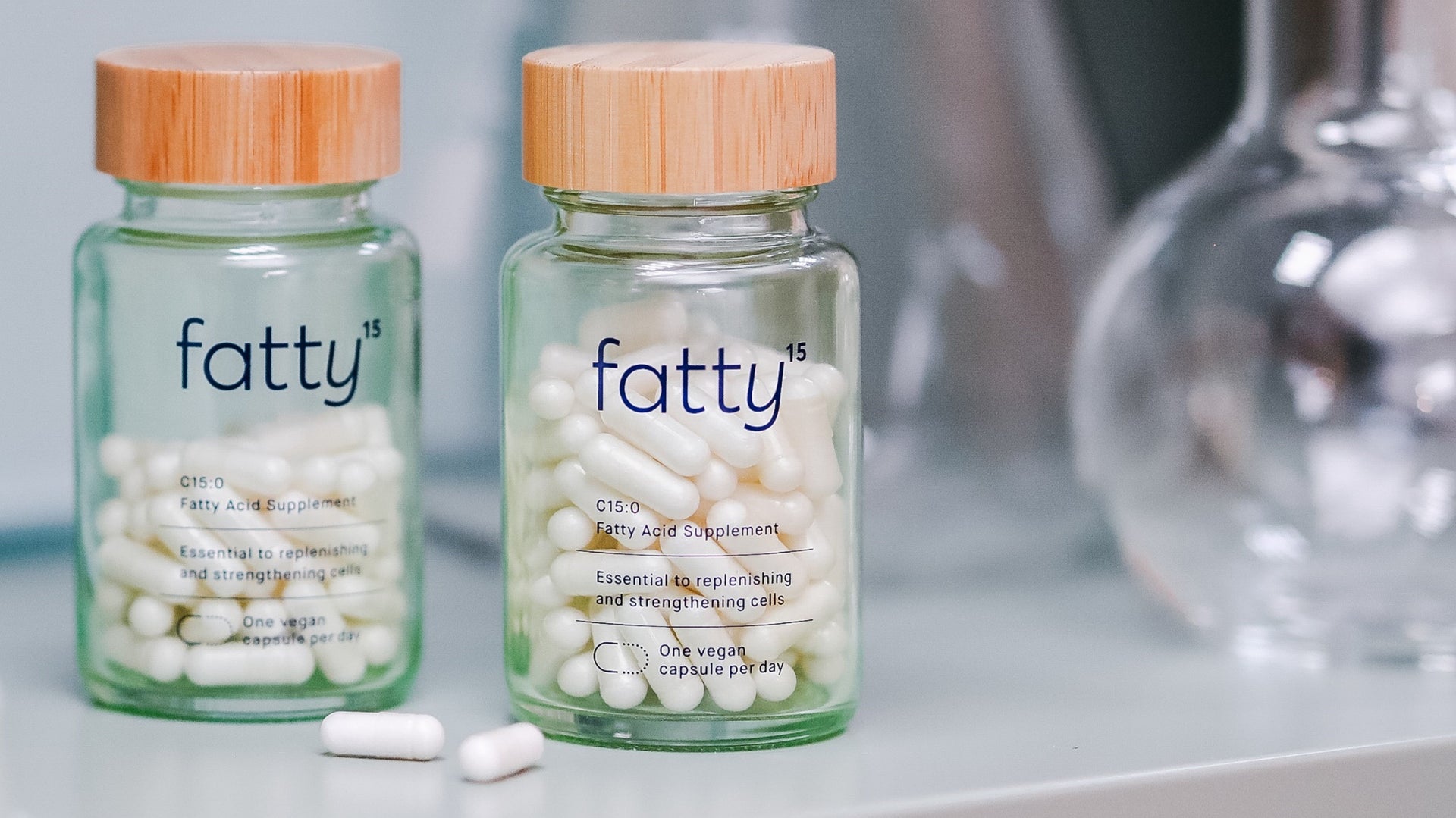 Fatty15 C15 supplement bottles on a table.