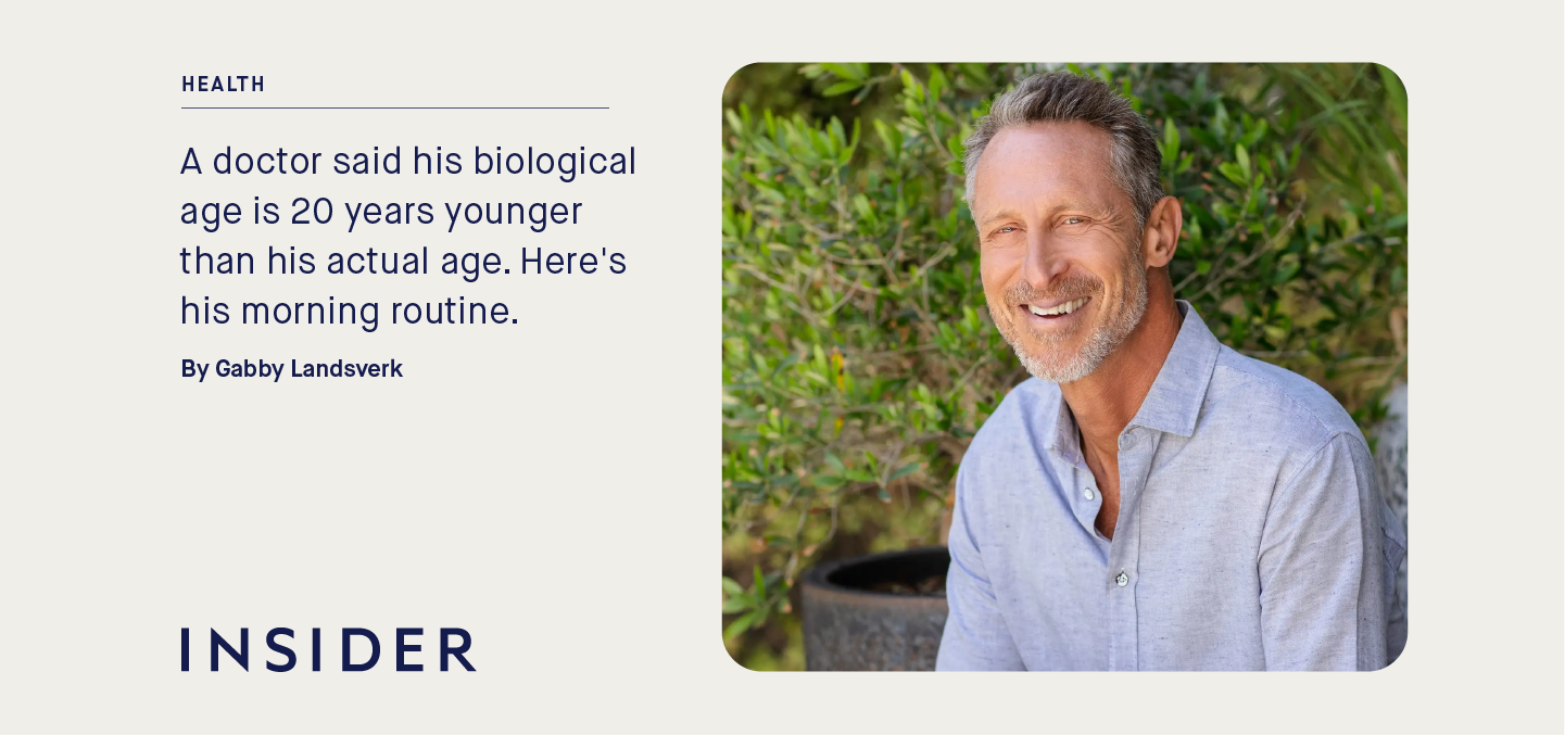 Man smiling outdoors, article on biological age and morning routine by Insider.