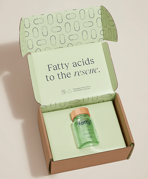 Open box with Fatty15's C15 supplement bottle, text reads Fatty acids to the rescue.