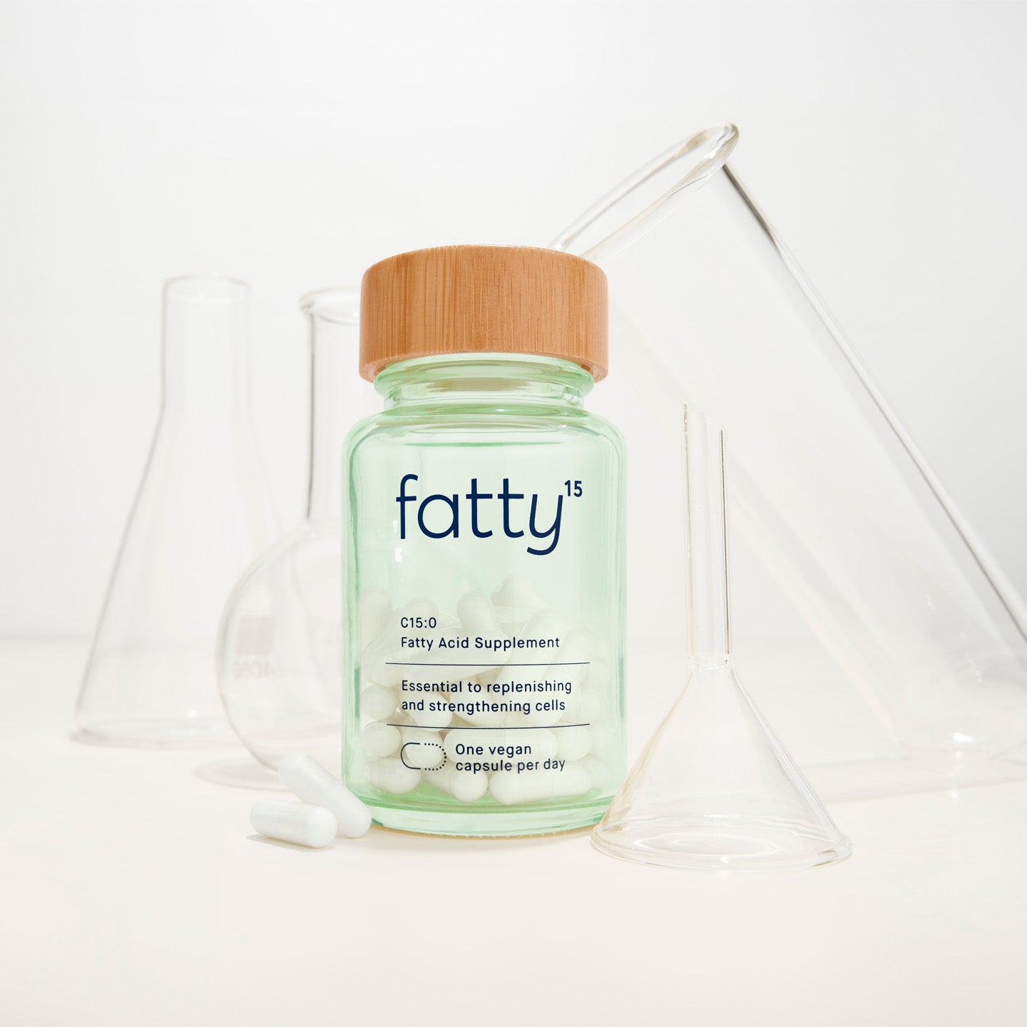 Fatty15's C15 supplement with lab equipment in background.