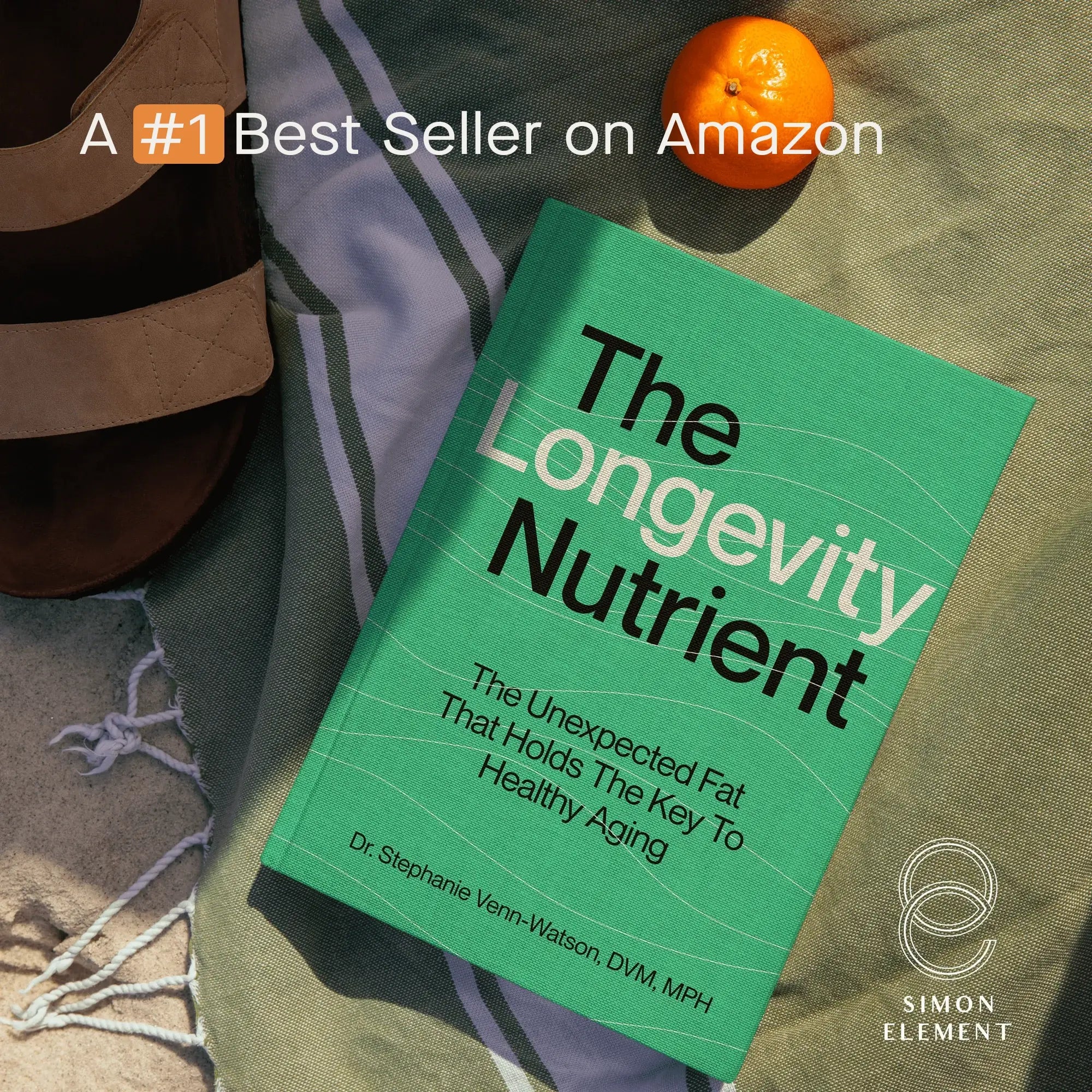 Book 'The Longevity Nutrient' labeled Best Seller on Amazon beside sandals and orange.